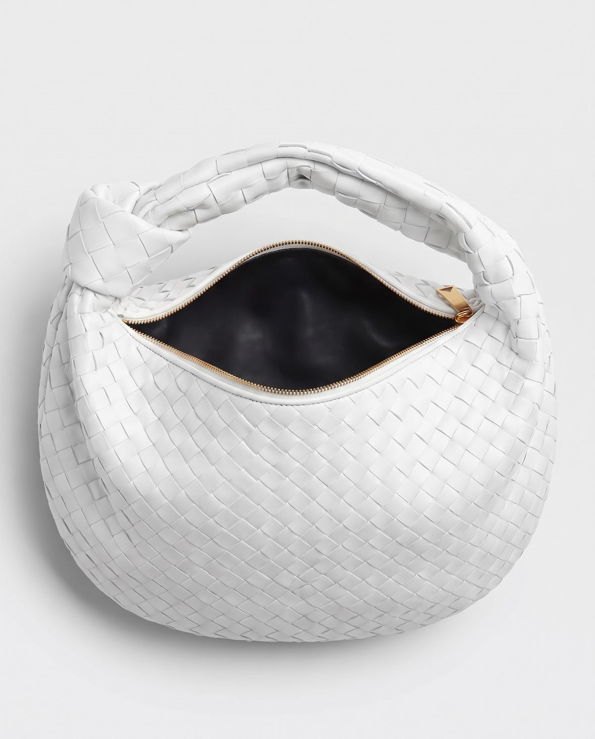 Knot Midi woven leather bag in White – inside view with the zip open