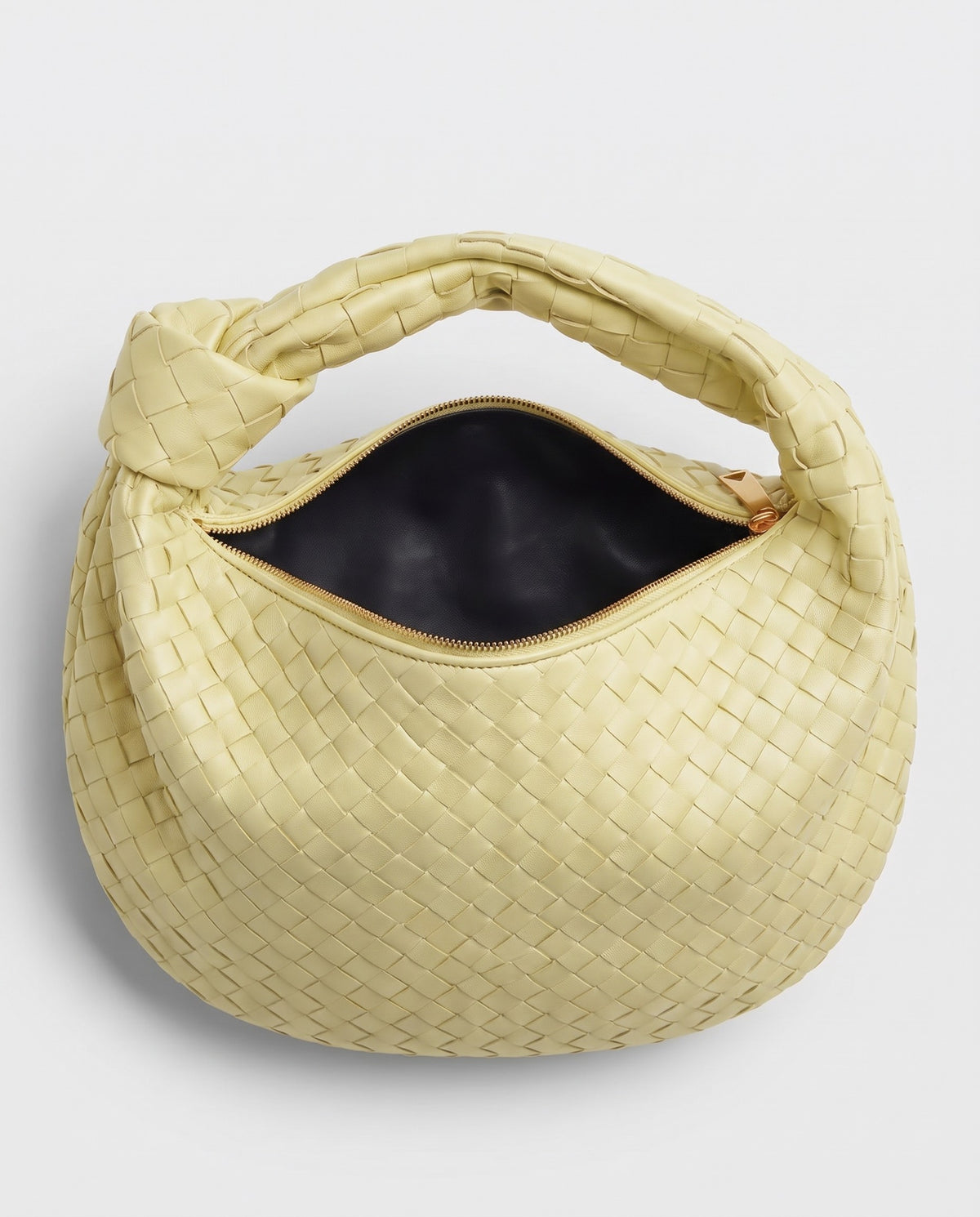 Knot Midi woven leather bag in Yellow – inside view with the zip open
