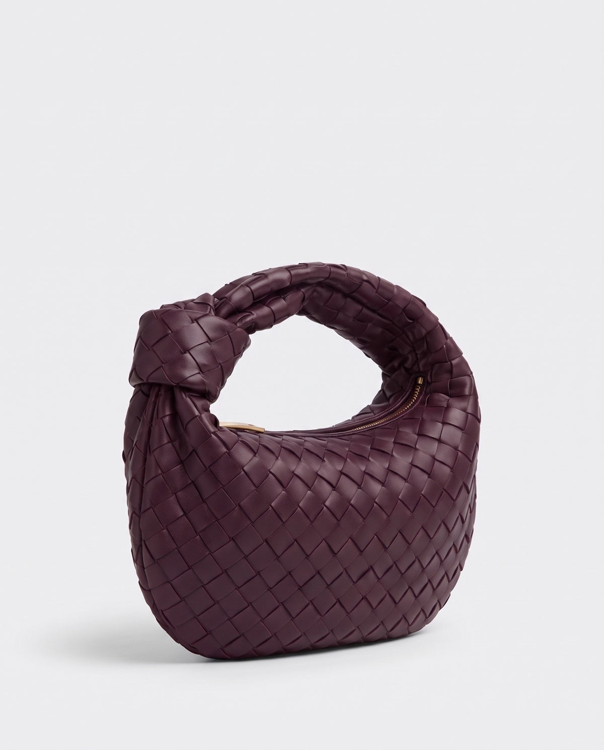 Knot Mini woven leather bag in Bordeaux – three-quarter view