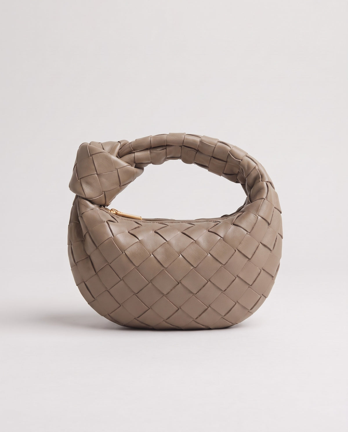 Knot Mini woven leather bag in Camel – front view