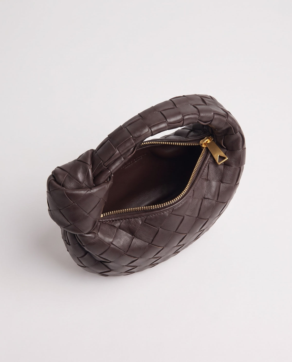 Knot Mini woven leather bag in Espresso – inside view with the zip open