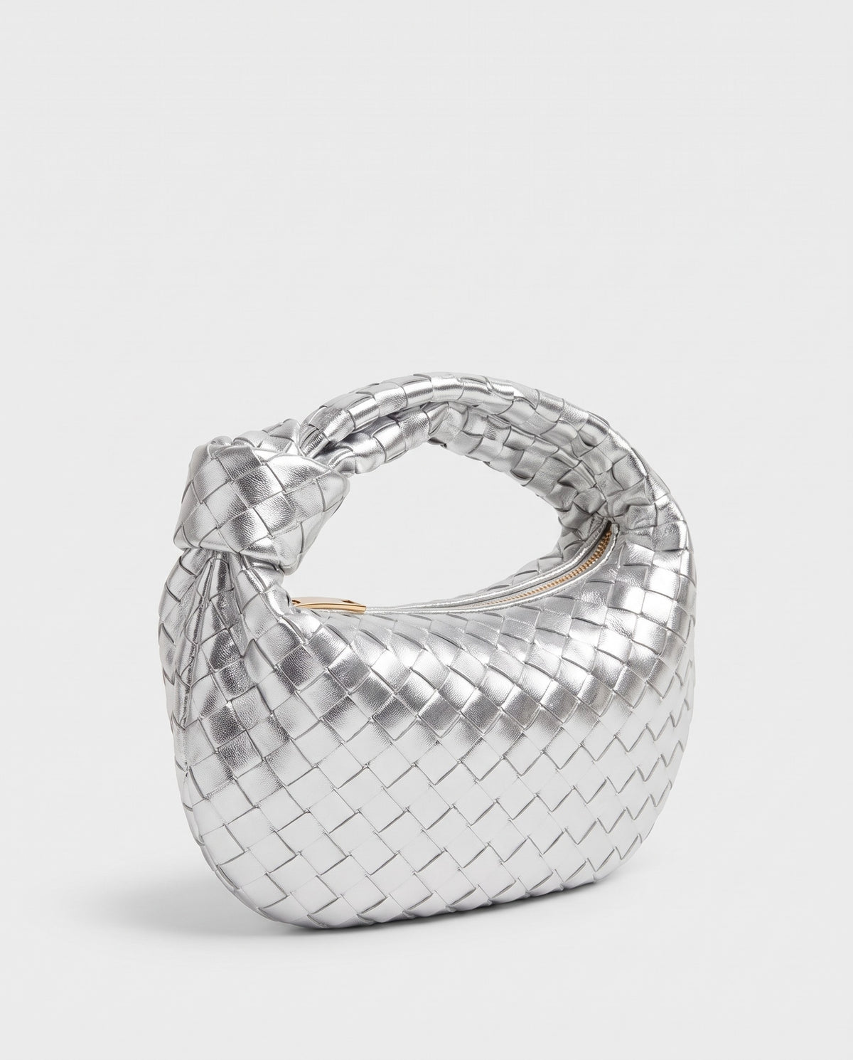 Knot Mini woven leather bag in Silver – three-quarter view