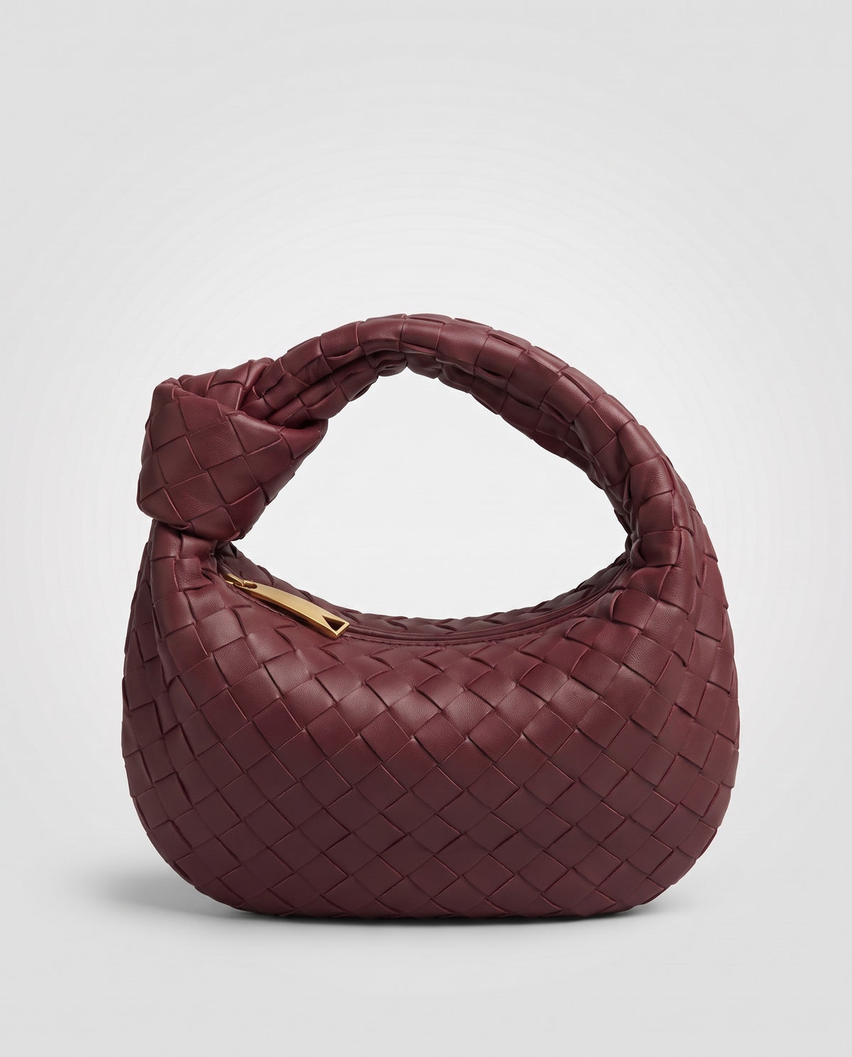 Knot Small woven leather bag in Bordeaux – three-quarter view