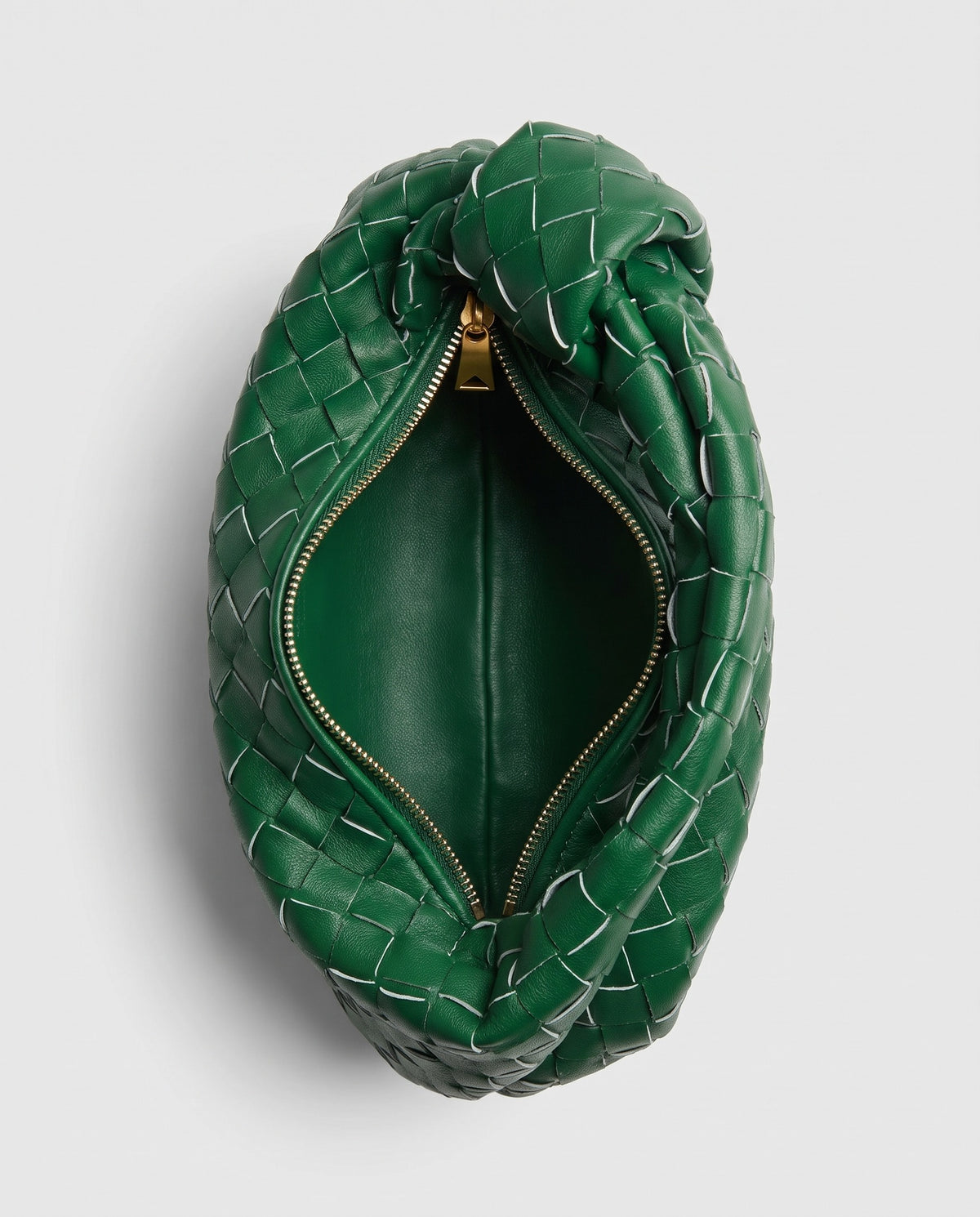 Knot Small woven leather bag in Green – inside view showing the lining and zip
