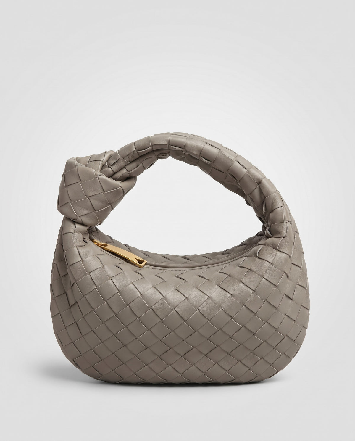 Knot Small woven leather bag in Stone – three-quarter view