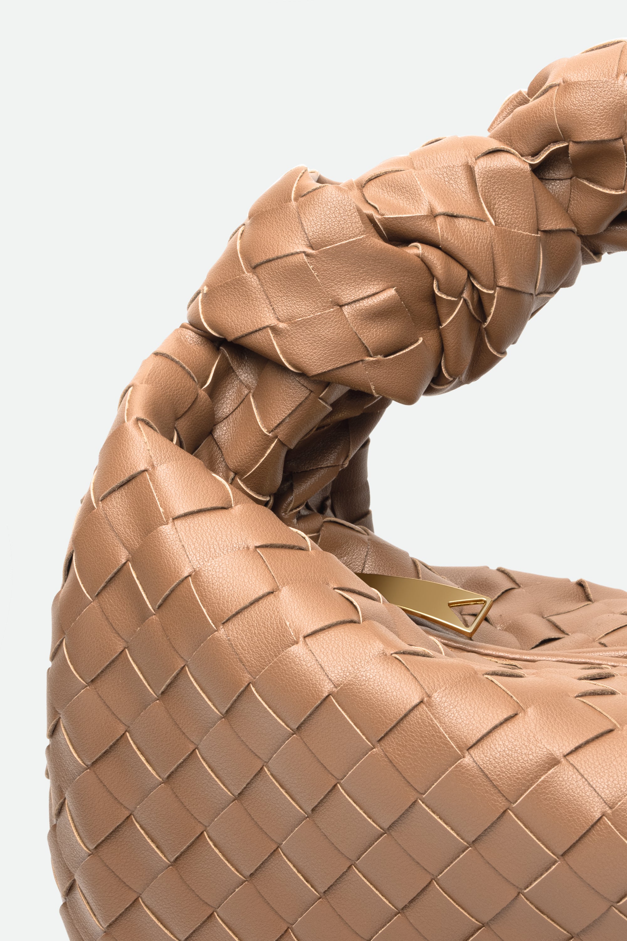 Close-up of Large Knot Bag (Jodie) light brown woven handbag with a knotted handle and gold hardware.