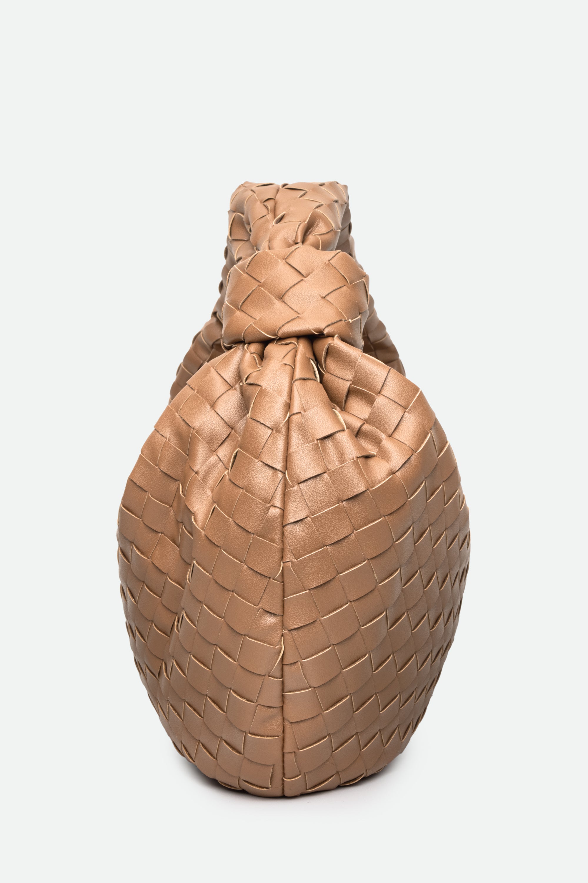 Large Knot Bag (Jodie) light brown woven handbag standing upright with a knotted top on a white background.