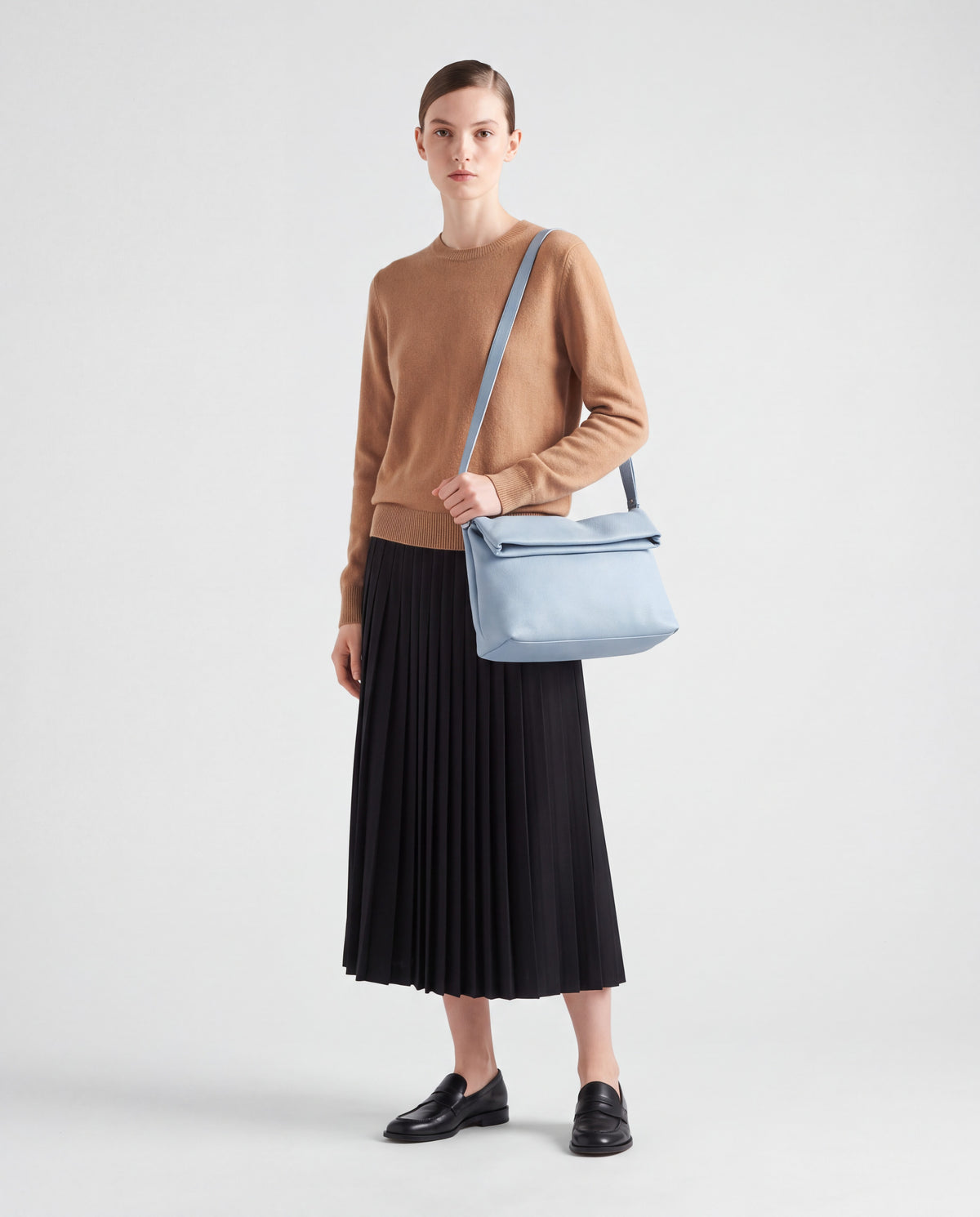Lido bag in Sky – worn by model, full length