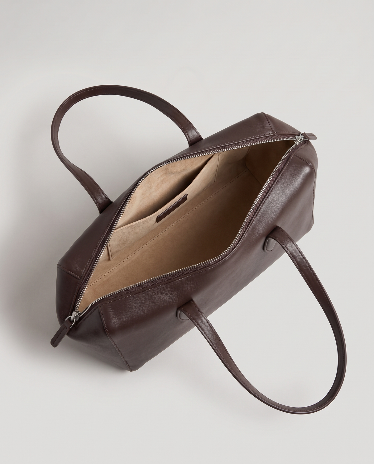Lira shoulder bag in espresso, open showing suede-look interior
