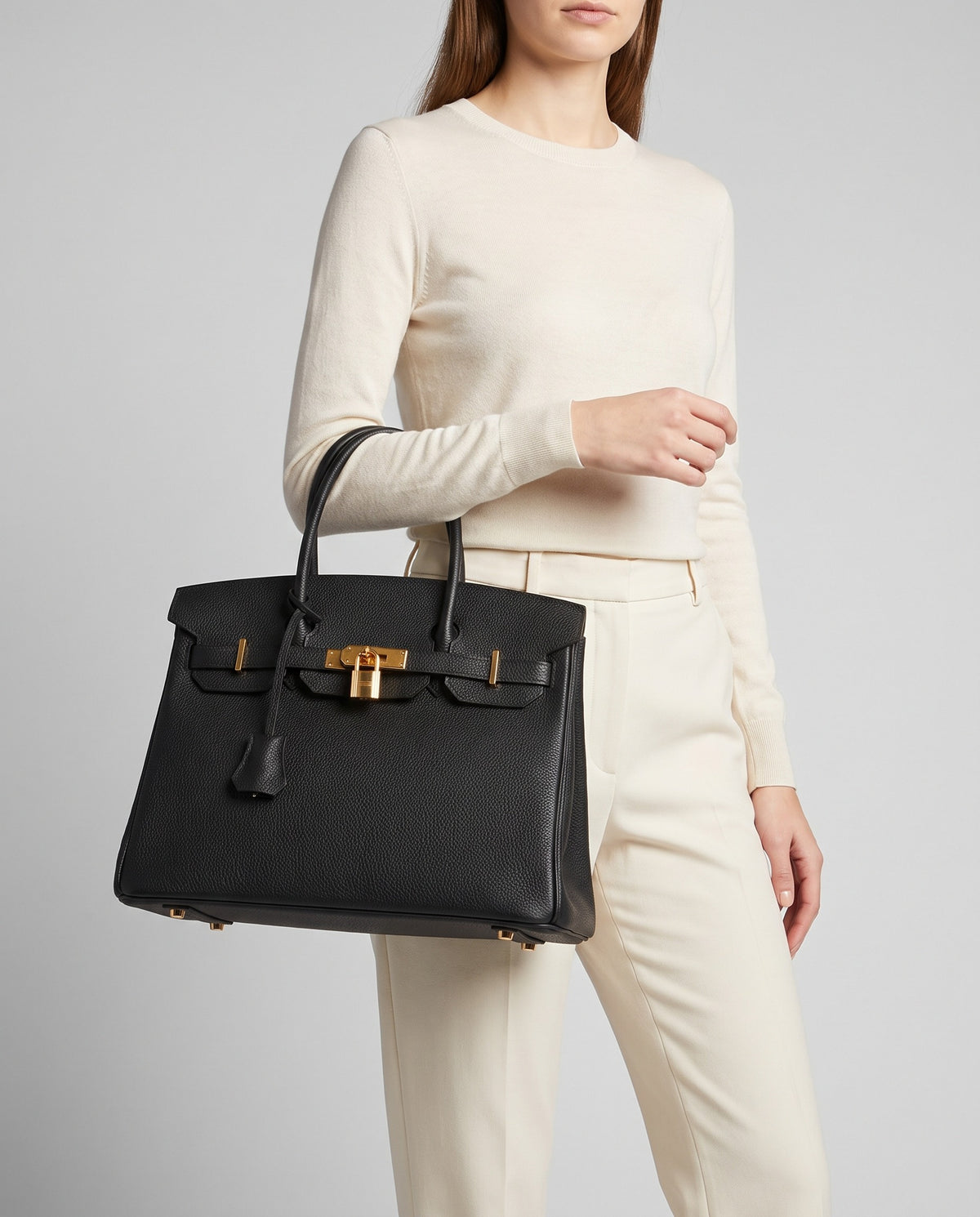 Lock Large leather top-handle bag in Black – model carrying it