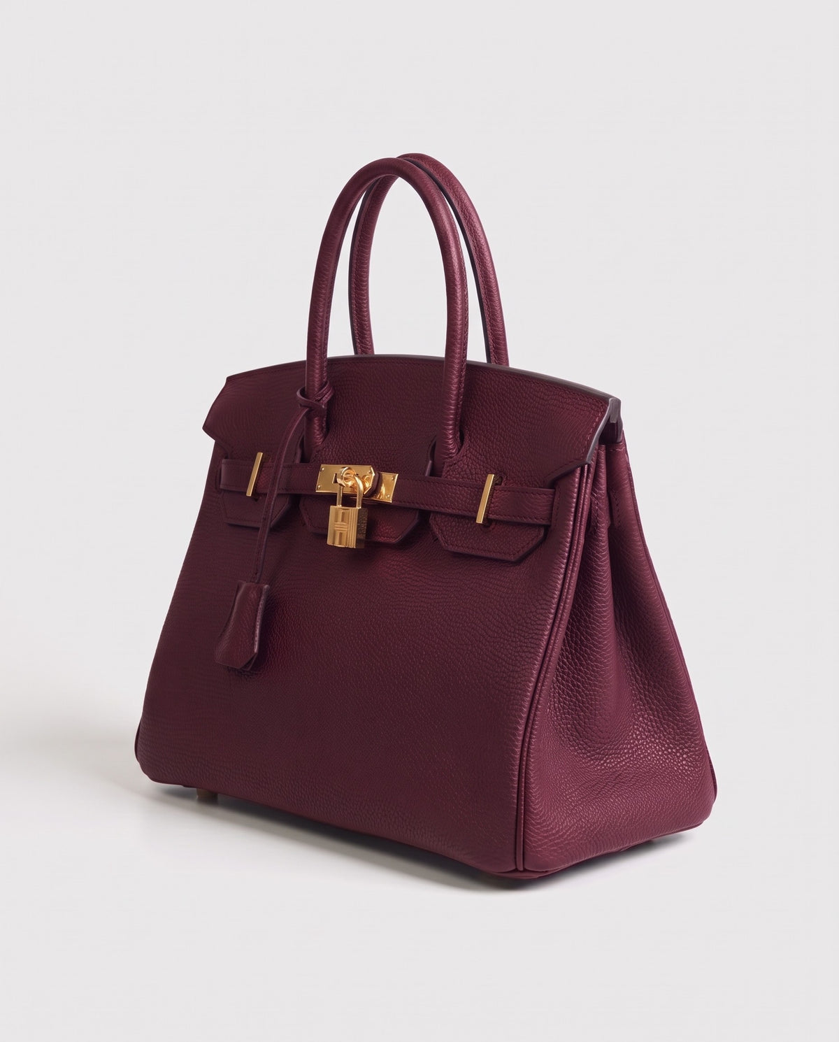 Lock Large leather top-handle bag in Bordeaux – three-quarter view