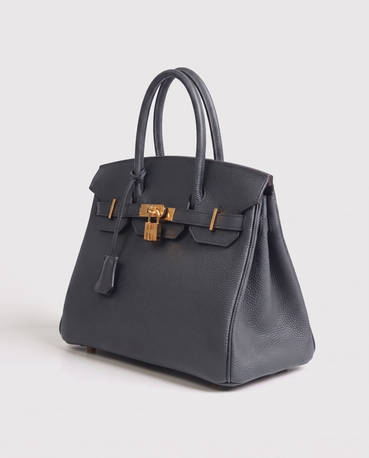 Lock Large leather top-handle bag in Charcoal – three-quarter view