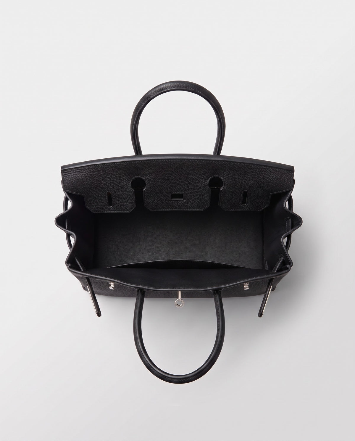 Lock Large leather top-handle bag in Onyx – inside view showing the leather lining