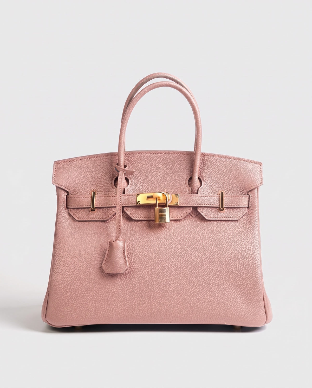 Lock Medium leather top-handle bag in Blush – front view