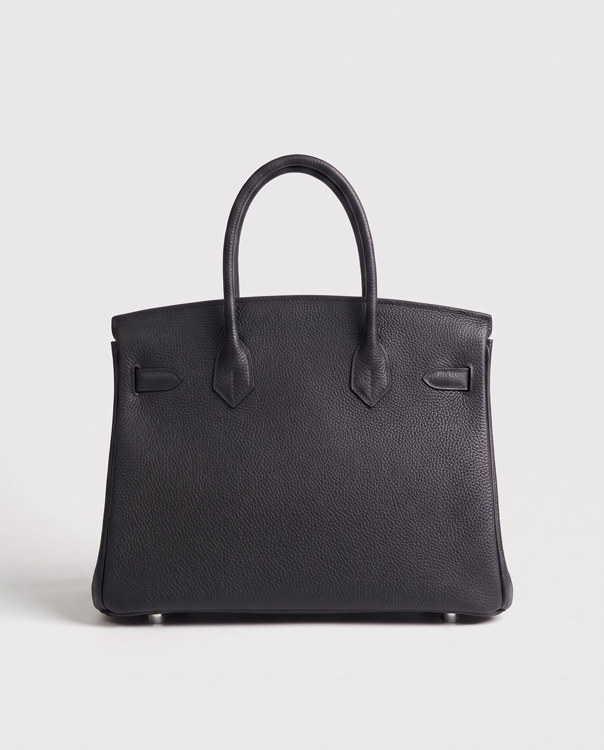 Lock Medium leather top-handle bag in Onyx – back view