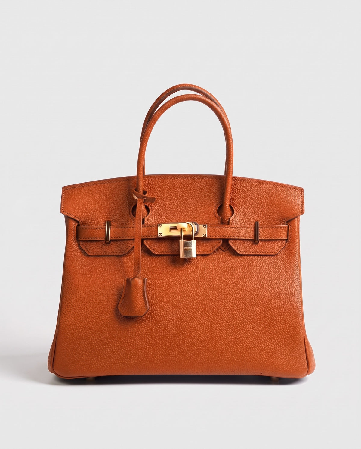 Lock Medium leather top-handle bag in Terracotta – front view