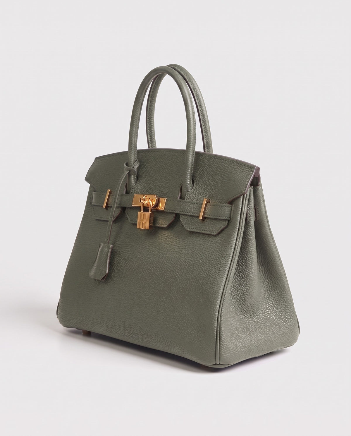 Lock Small leather top-handle bag in Celadon – three-quarter view