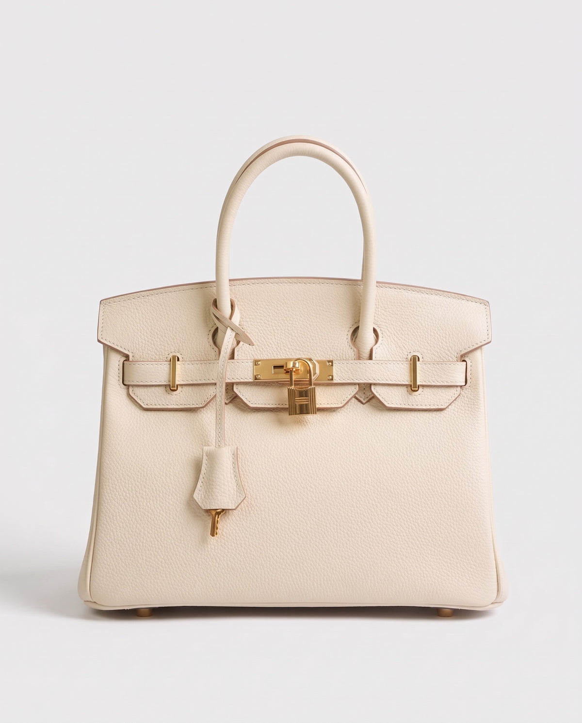 Lock Small leather top-handle bag in Cream – front view