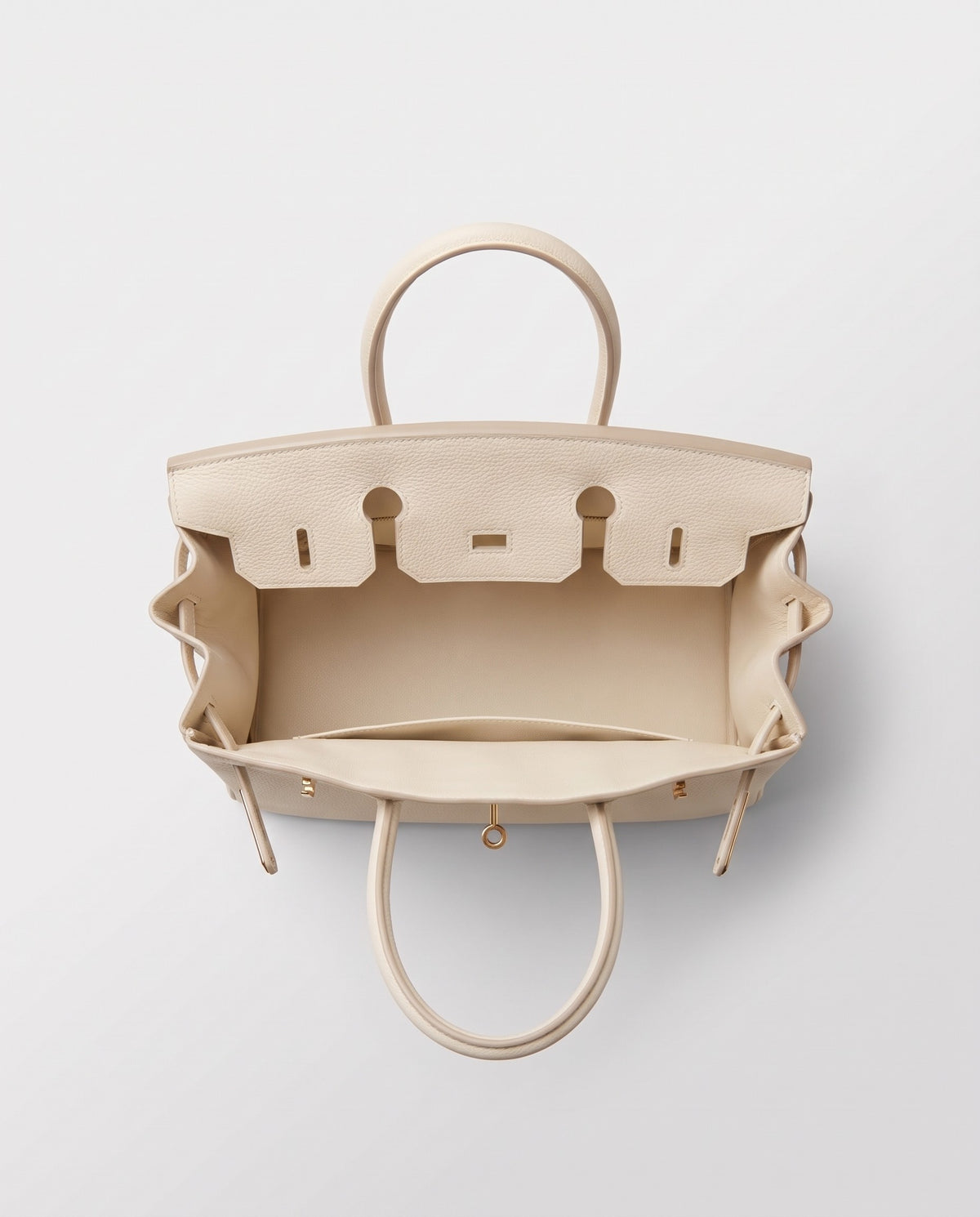 Lock Small leather top-handle bag in Cream – inside view showing the leather lining