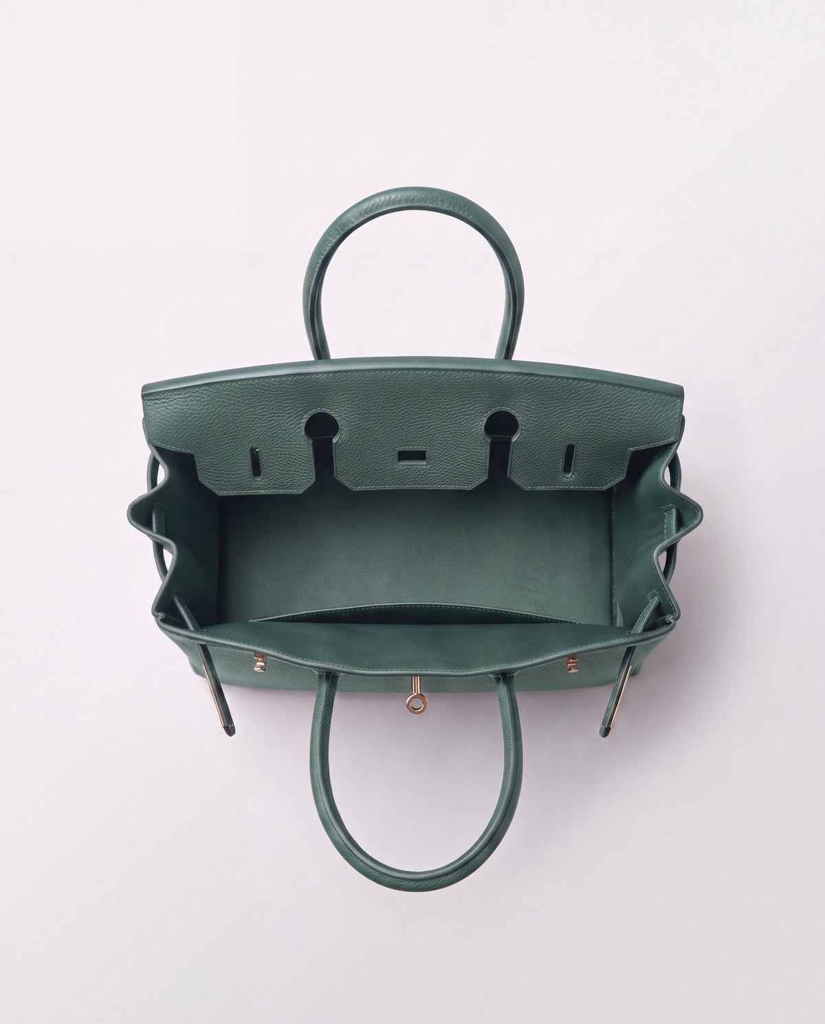 Lock Small leather top-handle bag in Velvet Green – inside view showing the leather lining