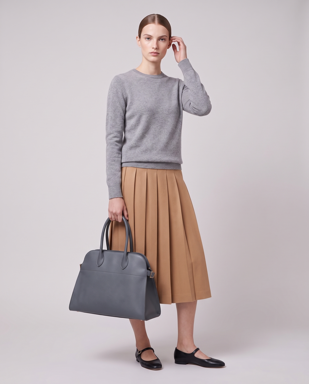 Model carrying the Milano Large bag in Slate grey leather – full length