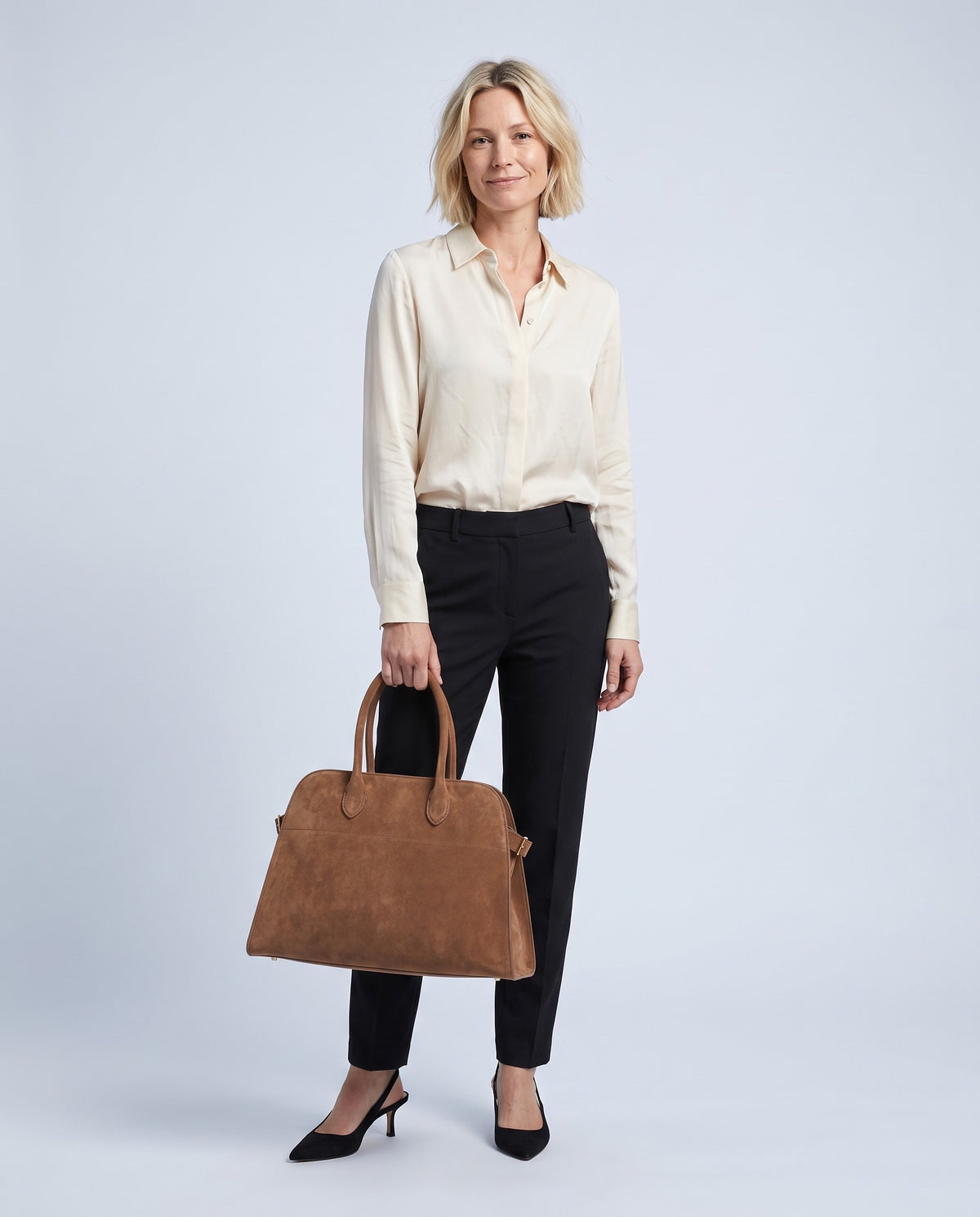 Model carrying the Milano Large bag in Mocha suede – full length