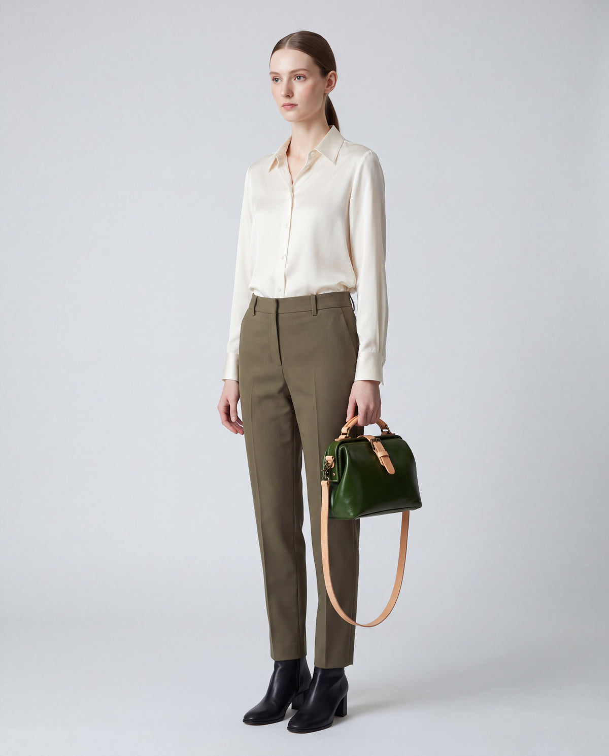 Mini Leather Bag bag in Green – worn by model, full length