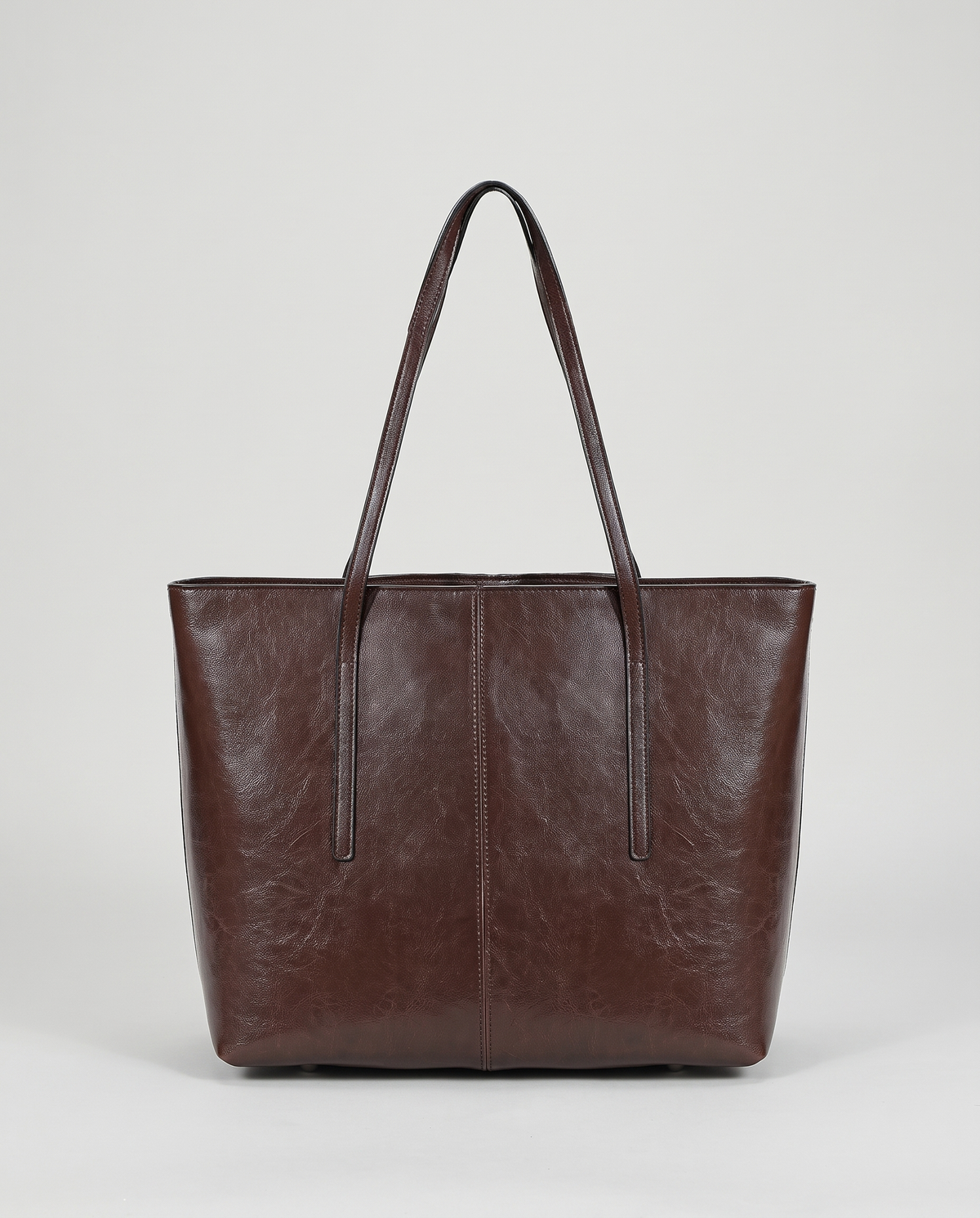 Molo oil-waxed leather tote in chocolate, front view
