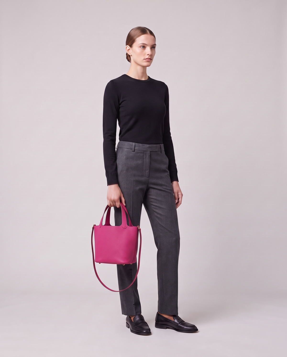 Model holding the Valentina Ostuni Large bag in Fuchsia, full length