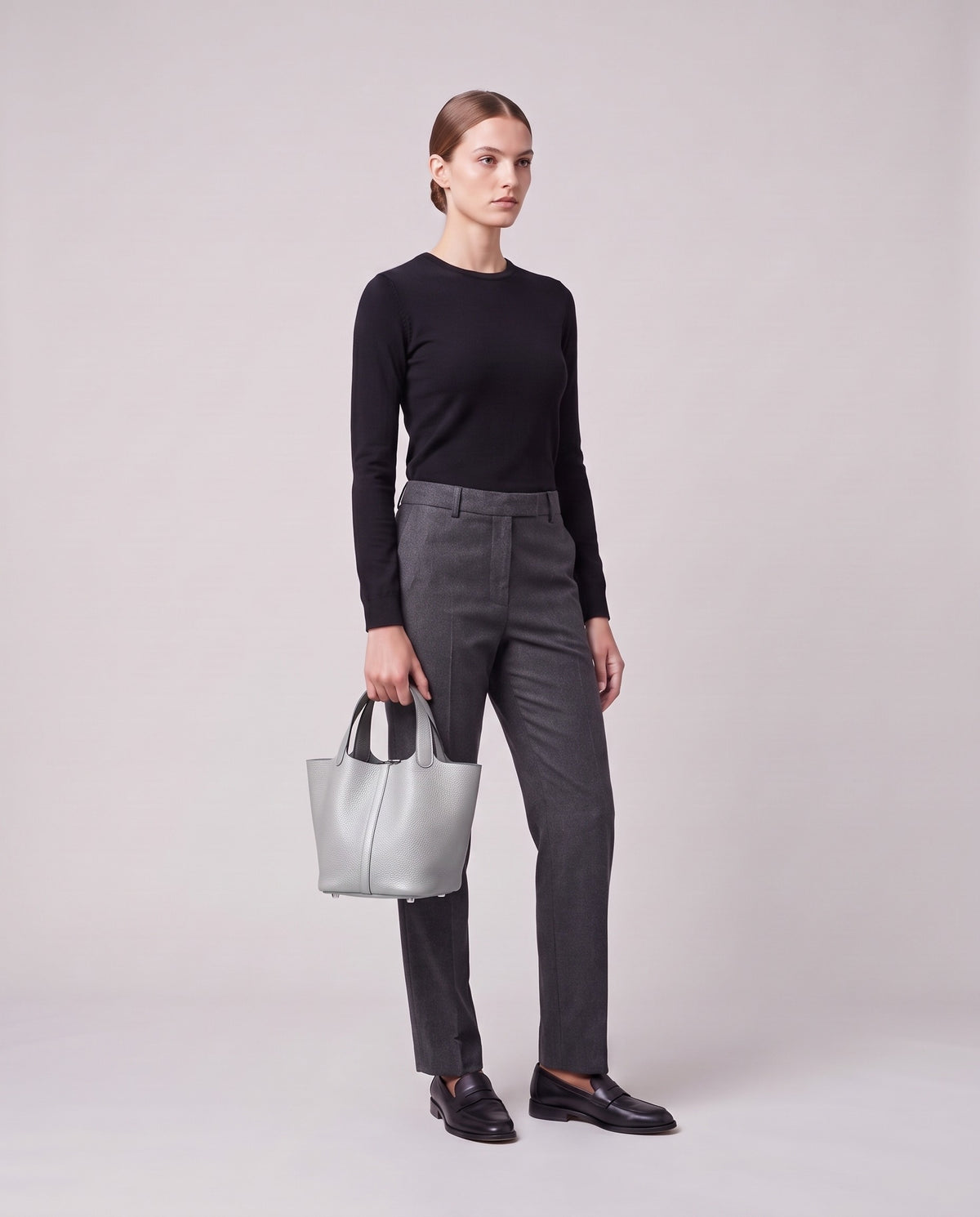 Model holding the Valentina Ostuni Small bag in Silver, full length