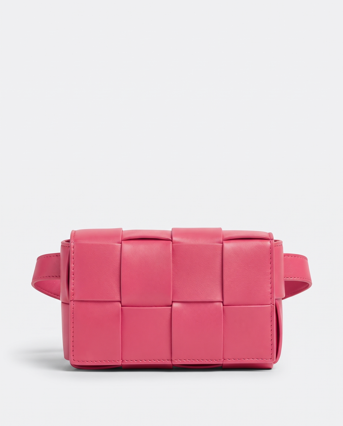 Cassette padded woven leather belt bag in Pink – front view
