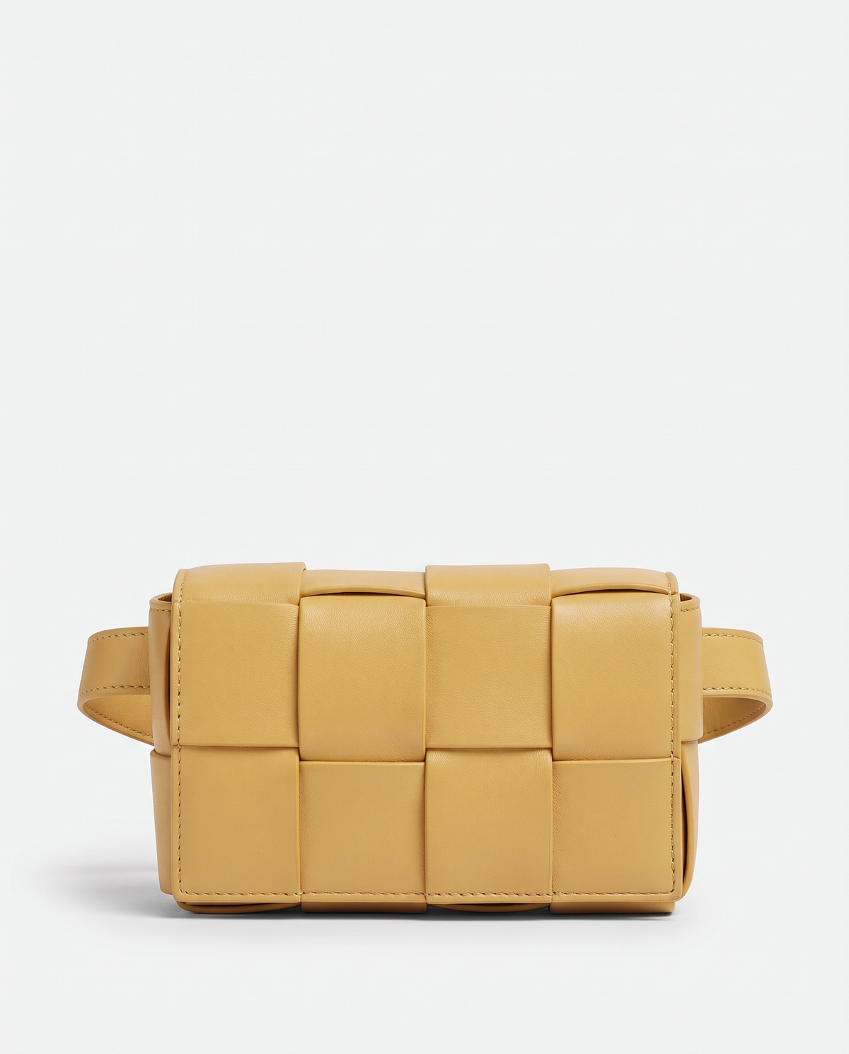Cassette padded woven leather belt bag in Yellow – front view