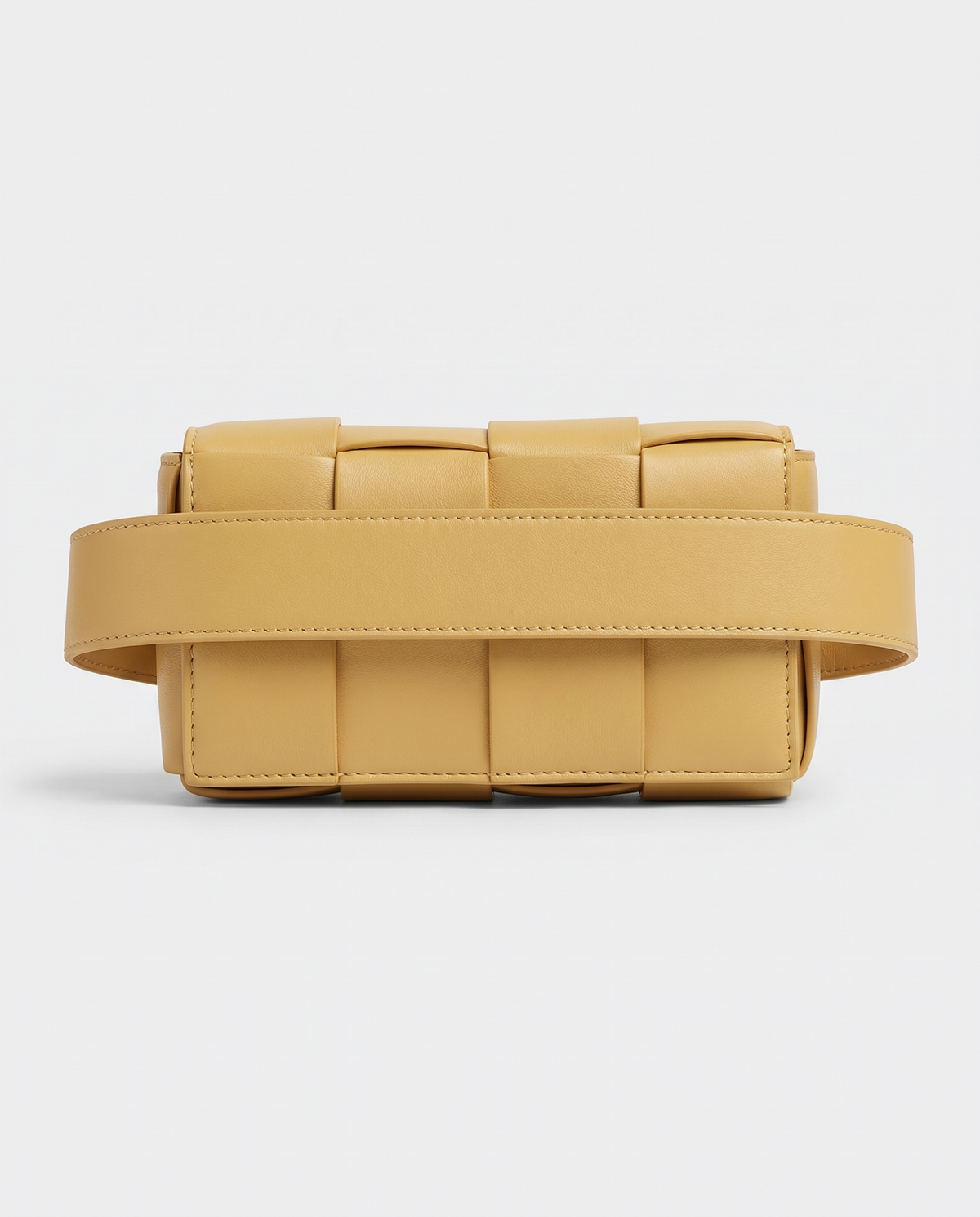 Cassette padded woven leather belt bag in Yellow – back view showing the belt strap