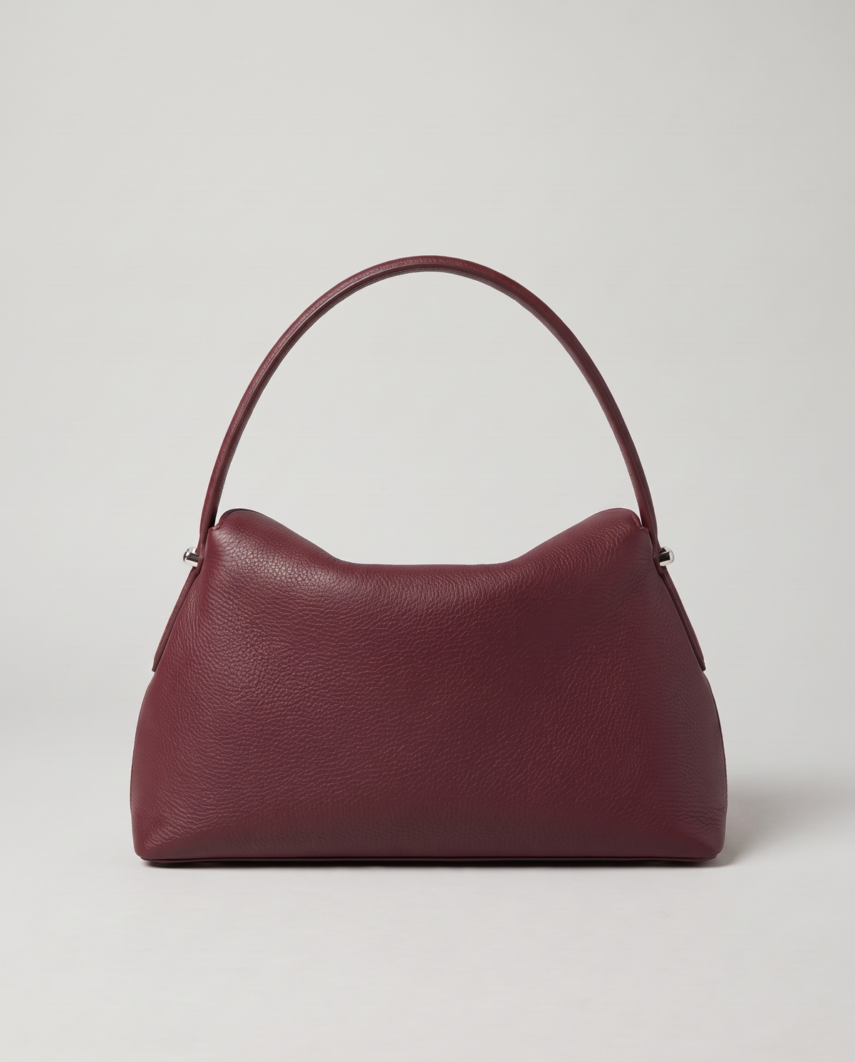 Porto pebbled leather top-handle bag in burgundy, back view