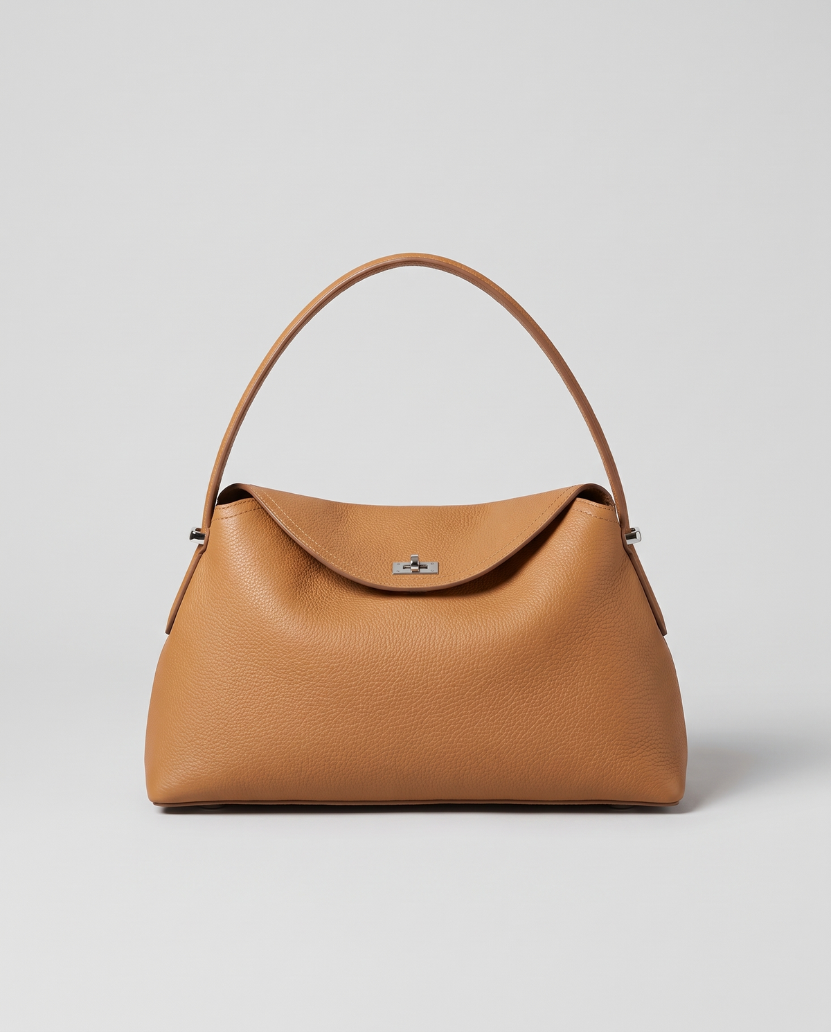 Porto pebbled leather top-handle bag in camel, front view