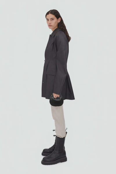 women with valentina mini knot bag