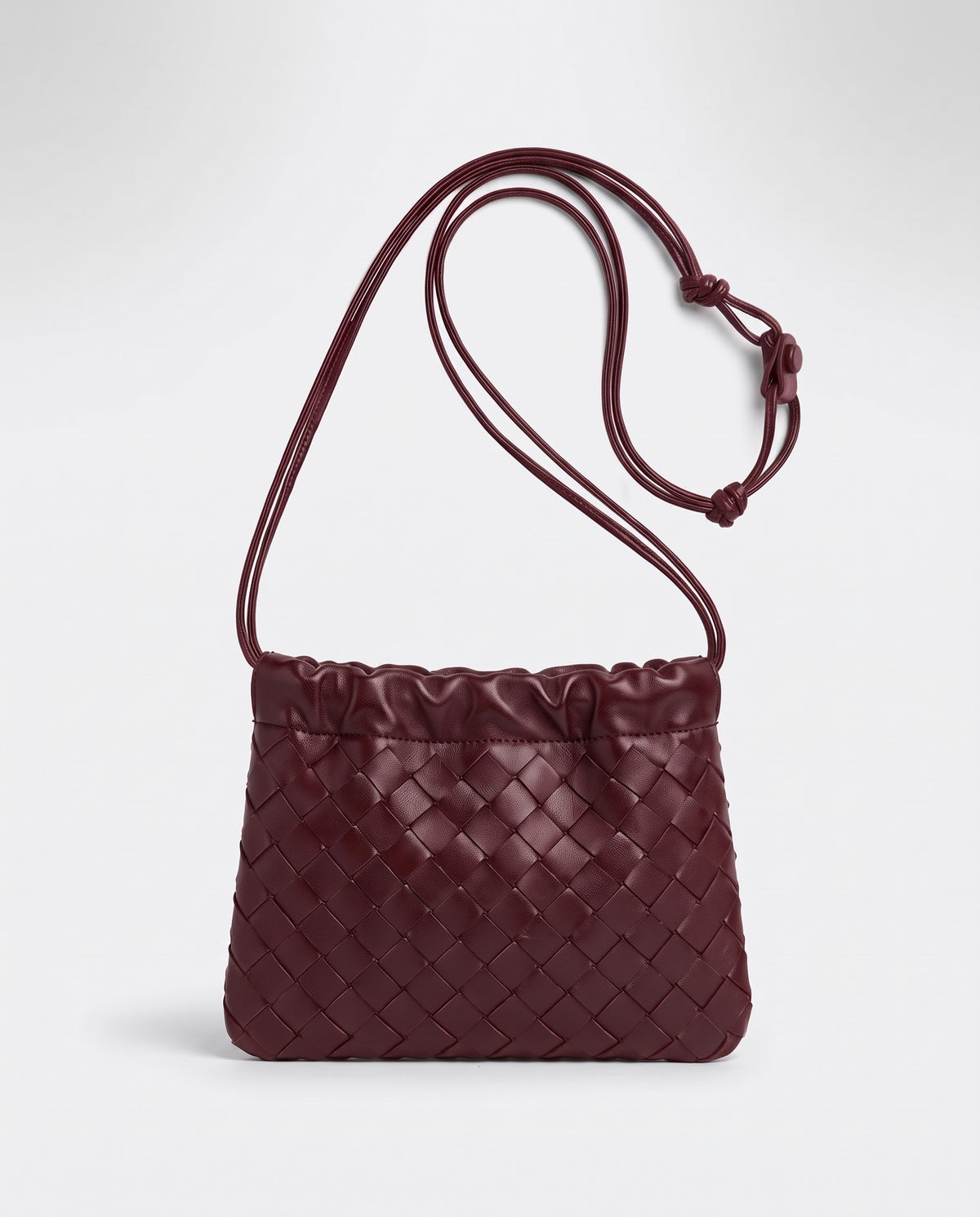 Serata woven leather clutch in Burgundy – front view