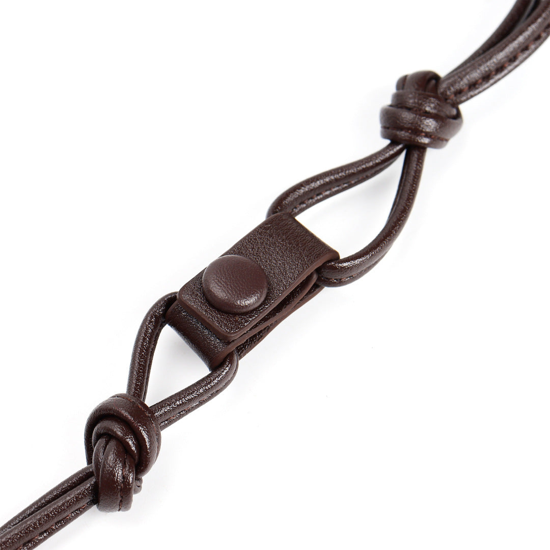 Slim Clutch (Andiamo) genuine leather strap and knot hardware detail close-up