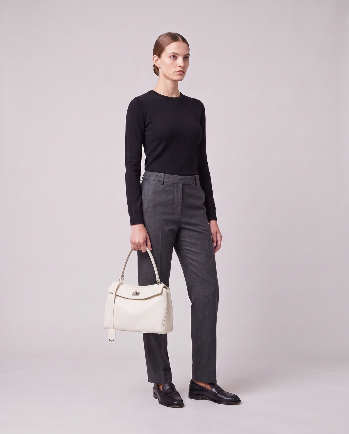 Model holding the Valentina Tinto Large bag in White, full length