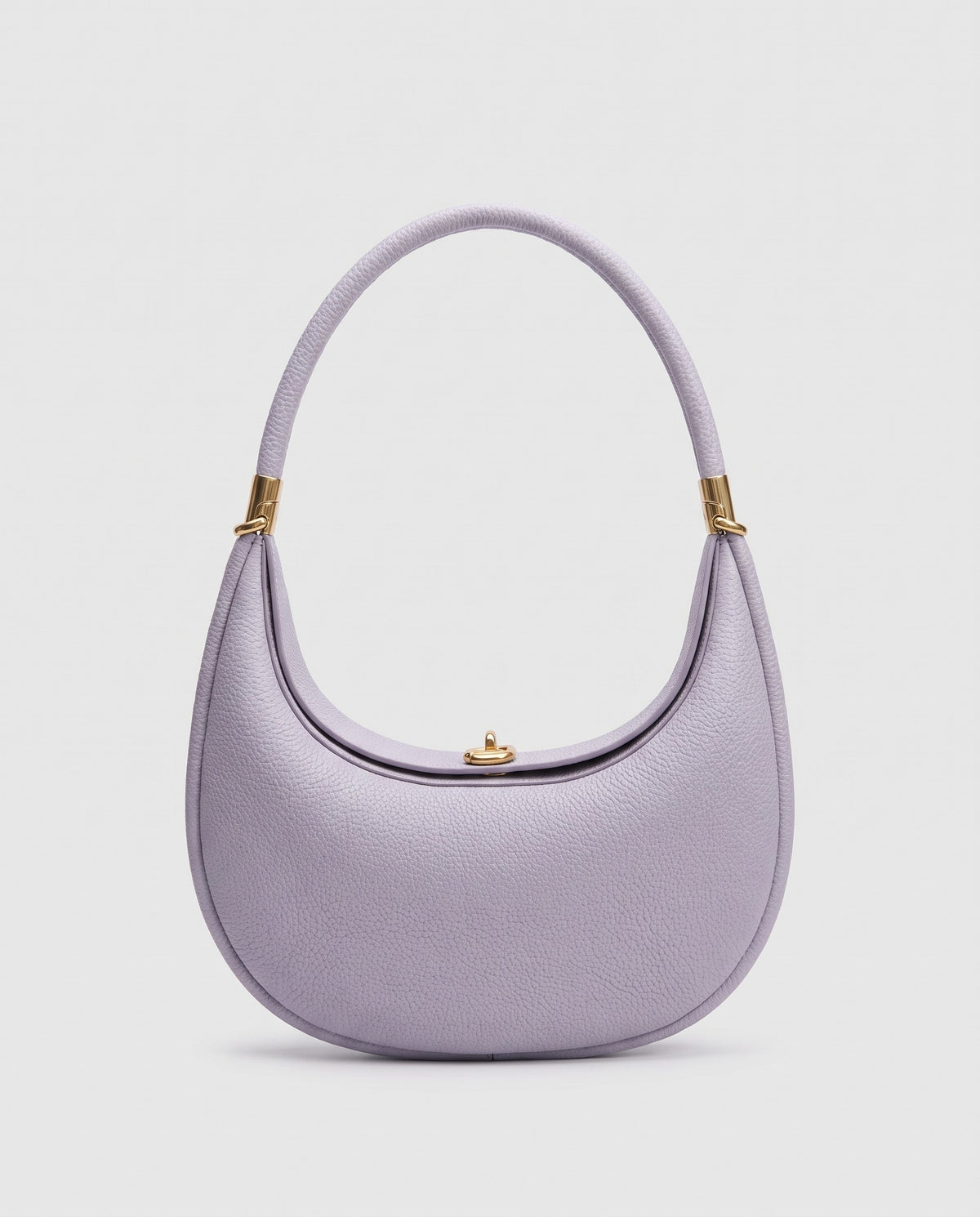 Todi pebbled leather crescent bag in Lavender – front view