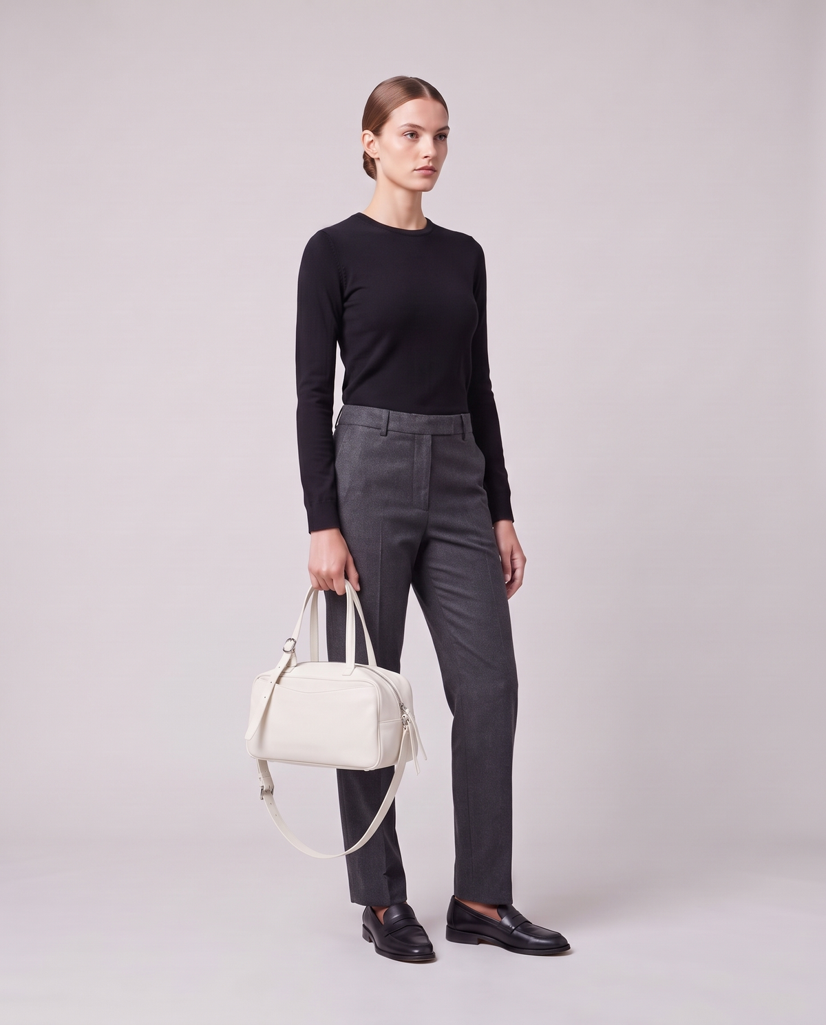 Model holding the Valentina Treviso Small bag in White, full length