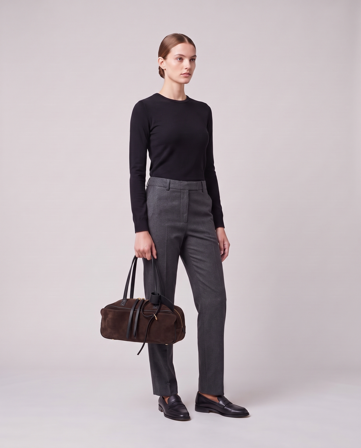 Model holding the Valentina Umbra Small bag in Chocolate, full length