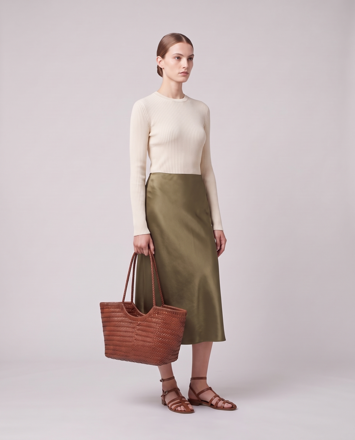 Model holding the Valentina Bosa bag in Cognac, full length