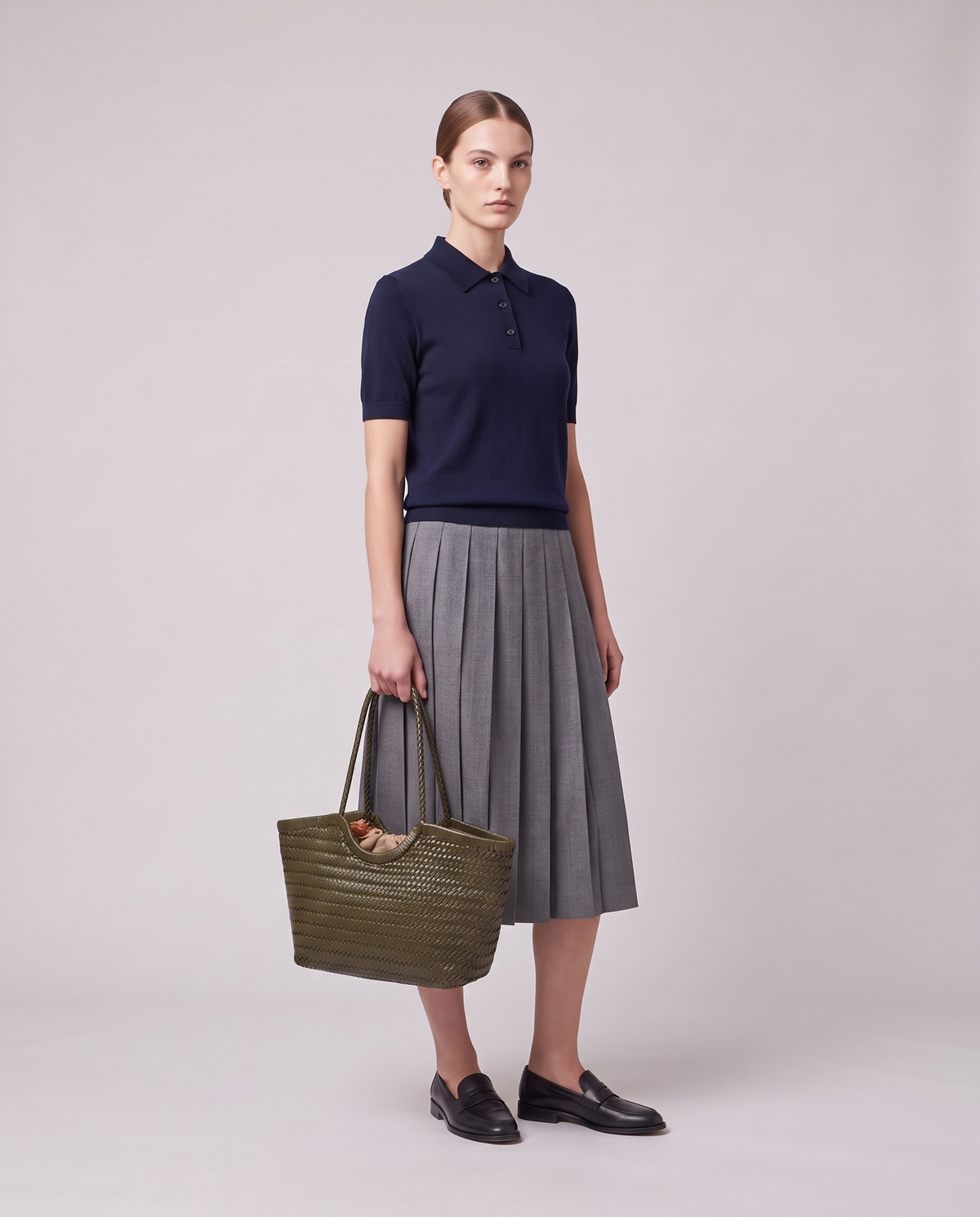 Model holding the Valentina Matera Large bag in Olive, full length