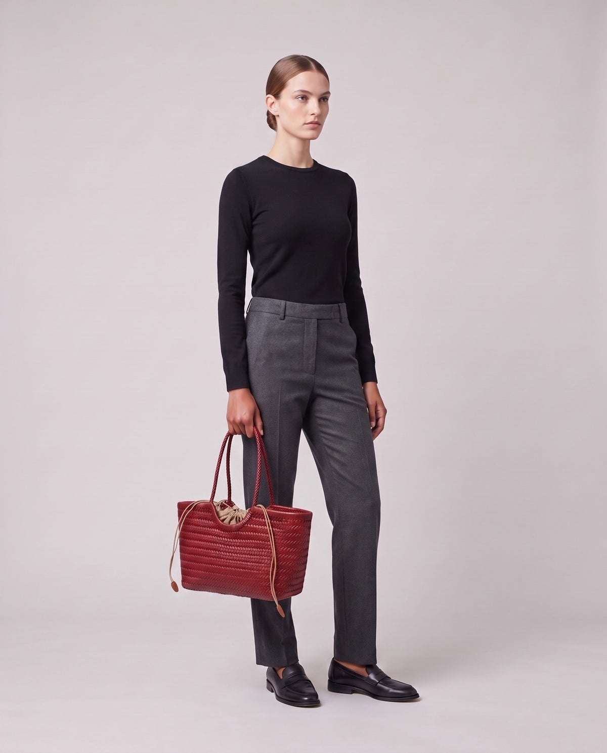 Model holding the Valentina Matera Small bag in Red, full length