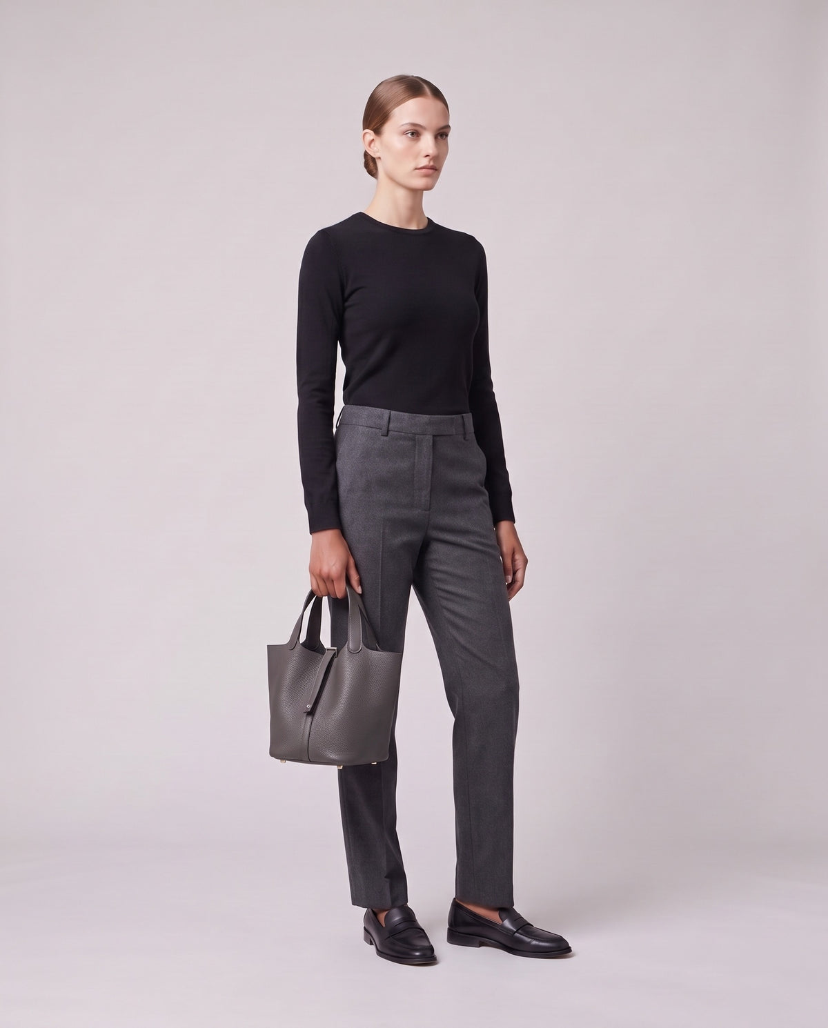 Model holding the Valentina Ostuni Large bag in Grey, full length