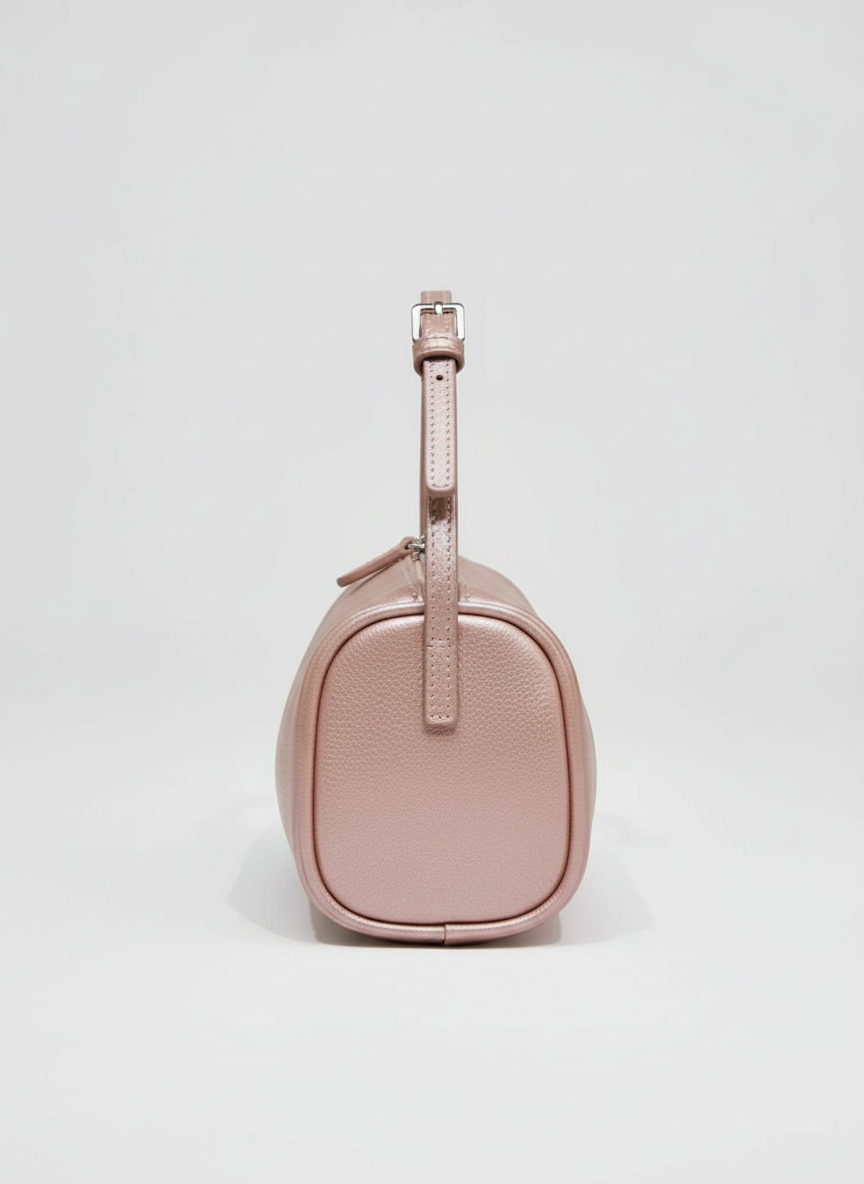 Valentina Roma barrel bag in blush pink pearlescent leather, side view