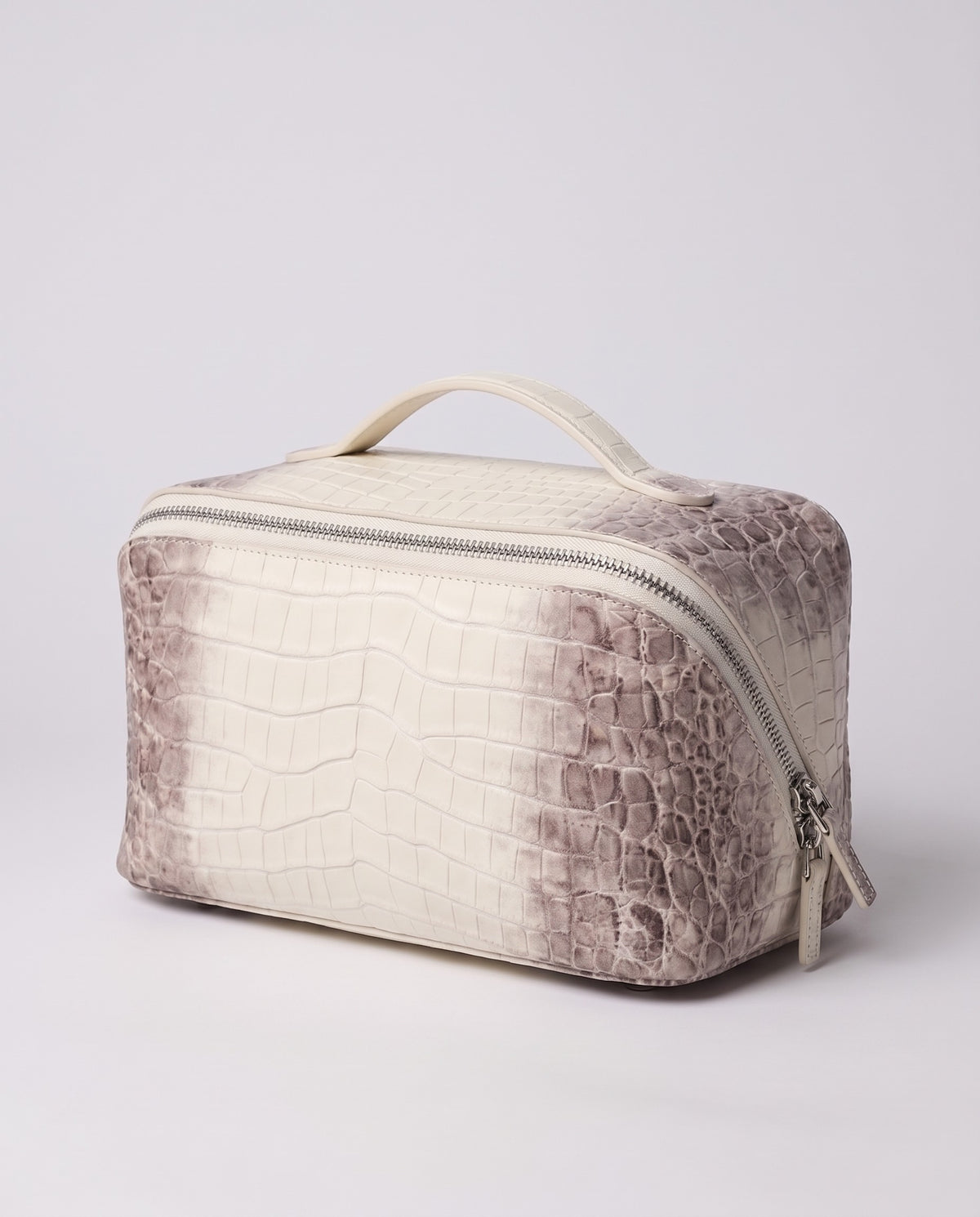 Varenna Medium croc-embossed vanity case in Pearl – three-quarter view