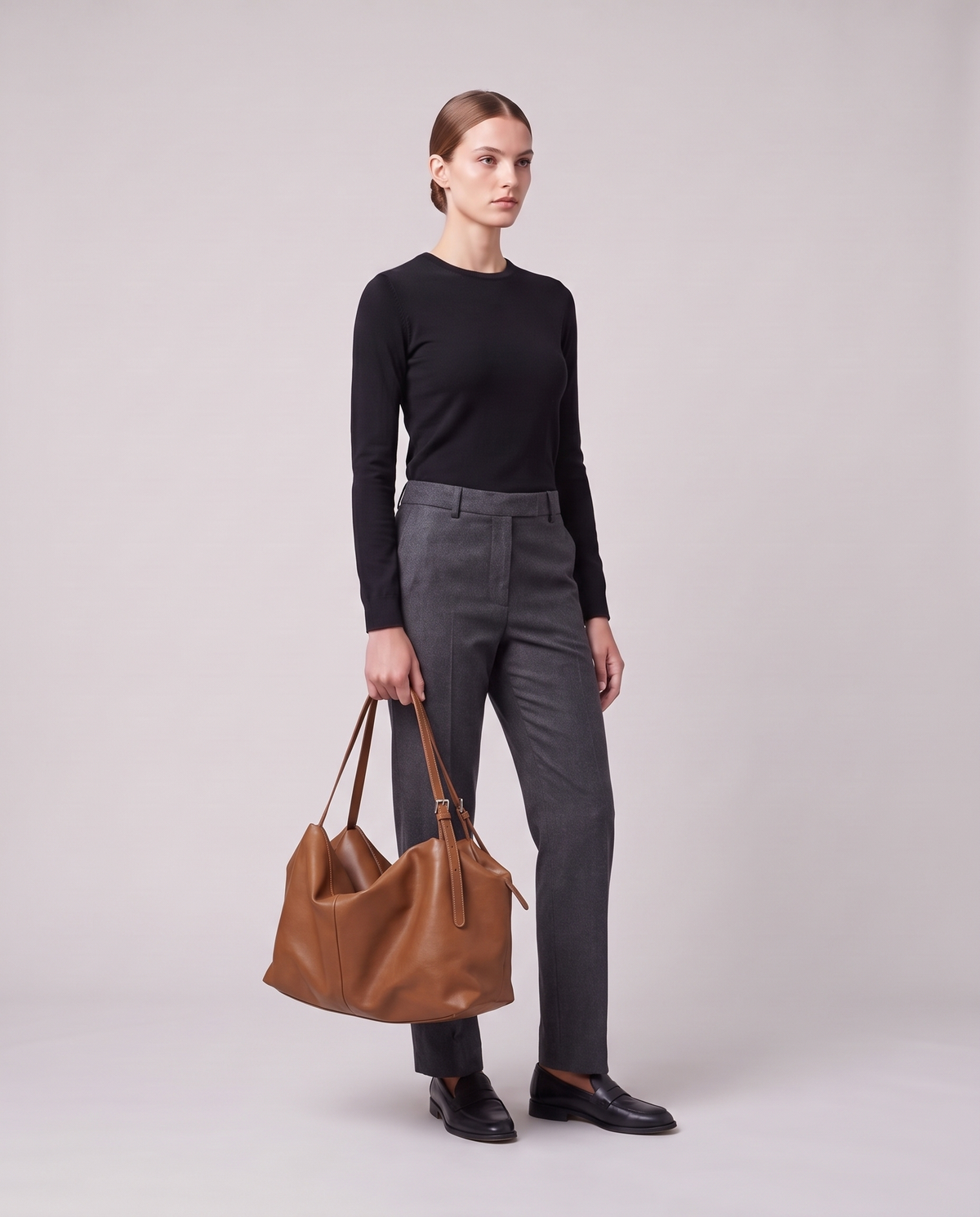 Model holding the Valentina Velluto Large bag in Caramel, full length