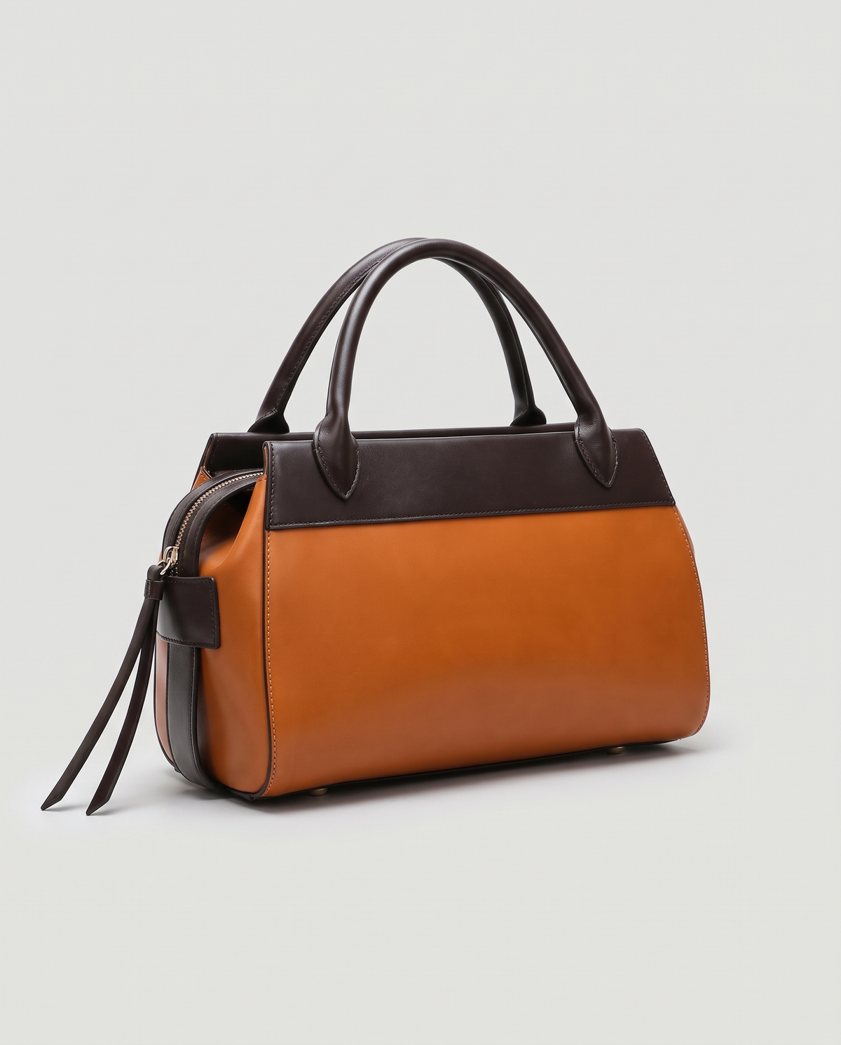 Patina two-tone leather handbag in Brown – three-quarter view